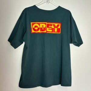 Obey Short Sleeve Tee in Teal with Red and Yellow Logo